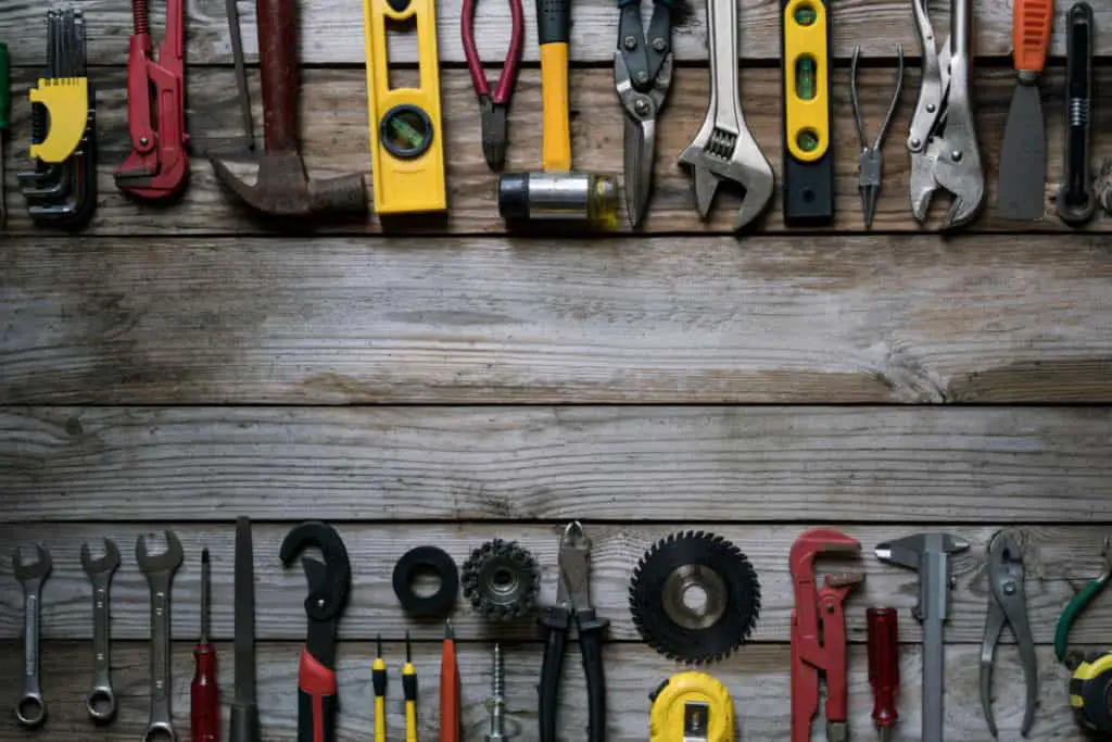 An In Depth Review of Gorilla Playsets: Are They Worth It? 11 Canva Old tools on wood table background