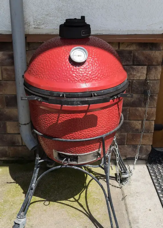 Canva Ceramic grill kamado barbecue stands on the street. Rosa Khutor
